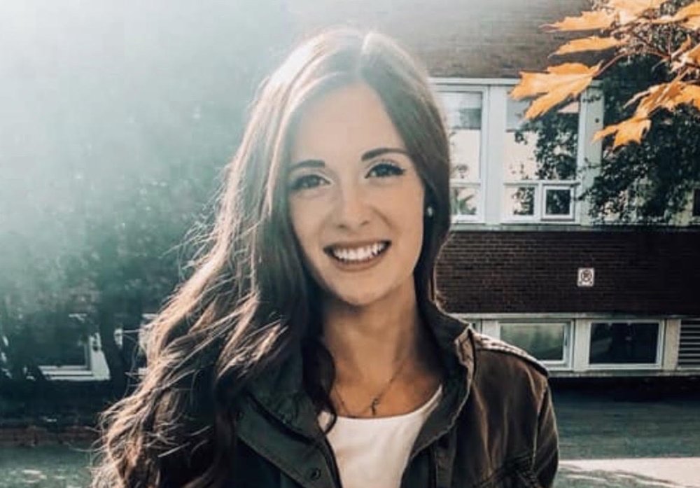 Carly Brown, Speech-Language Pathologist, smiling outdoors